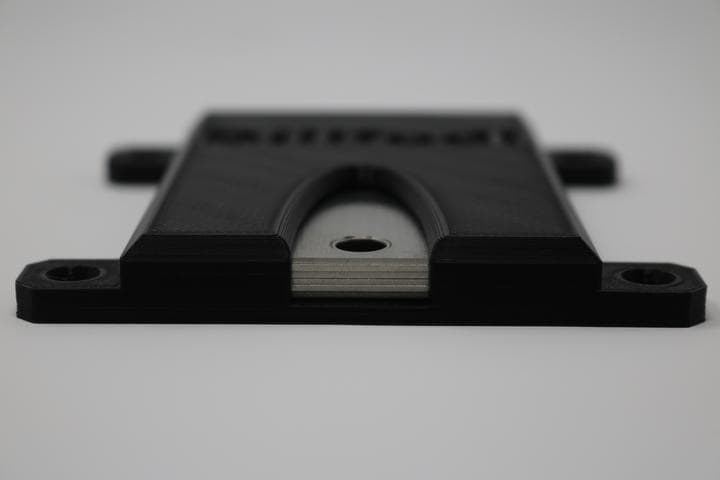 Compact black hardware mount