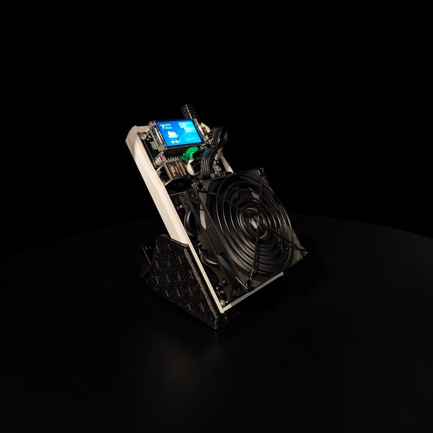 Side angle of Hammer Miner BC04 Stand with miner installed on black desktop