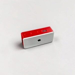 CryptoCloaks custom SeedSigner case, red body with white accent, photo 5; assembled electronics shown for illustration only
